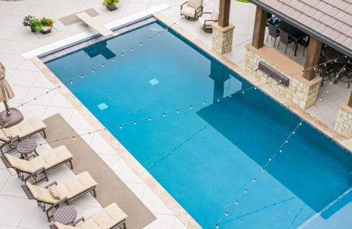 imgi_12_65c13af537ad278339381939_cool-pool-deck-coating-aerialview-compressed-scaled-reyaa9n6kxrtpwyk560sgo8m5v3xqnhm8zxczleanc